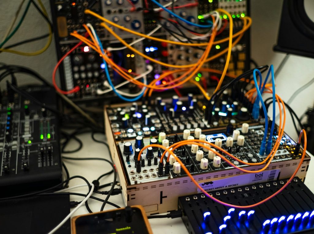 a bunch of electronic equipment sitting on top of a table